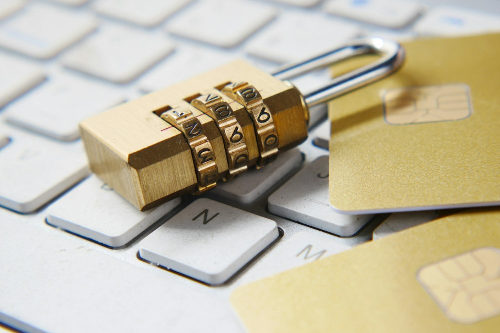 A combination padlock resting on a keyboard